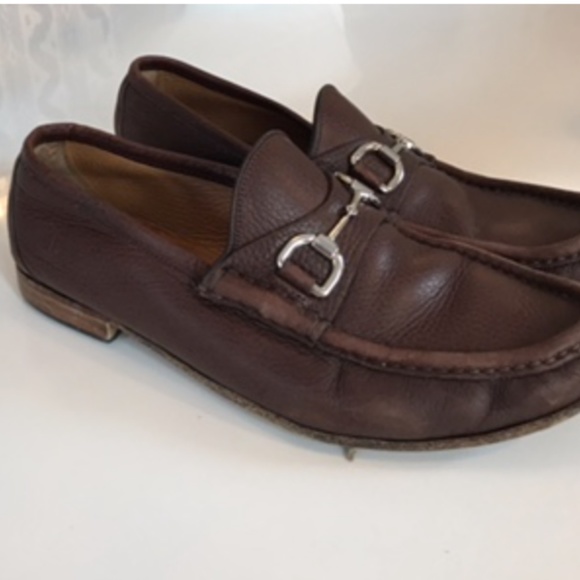 Brown Gucci horse-bit loafers